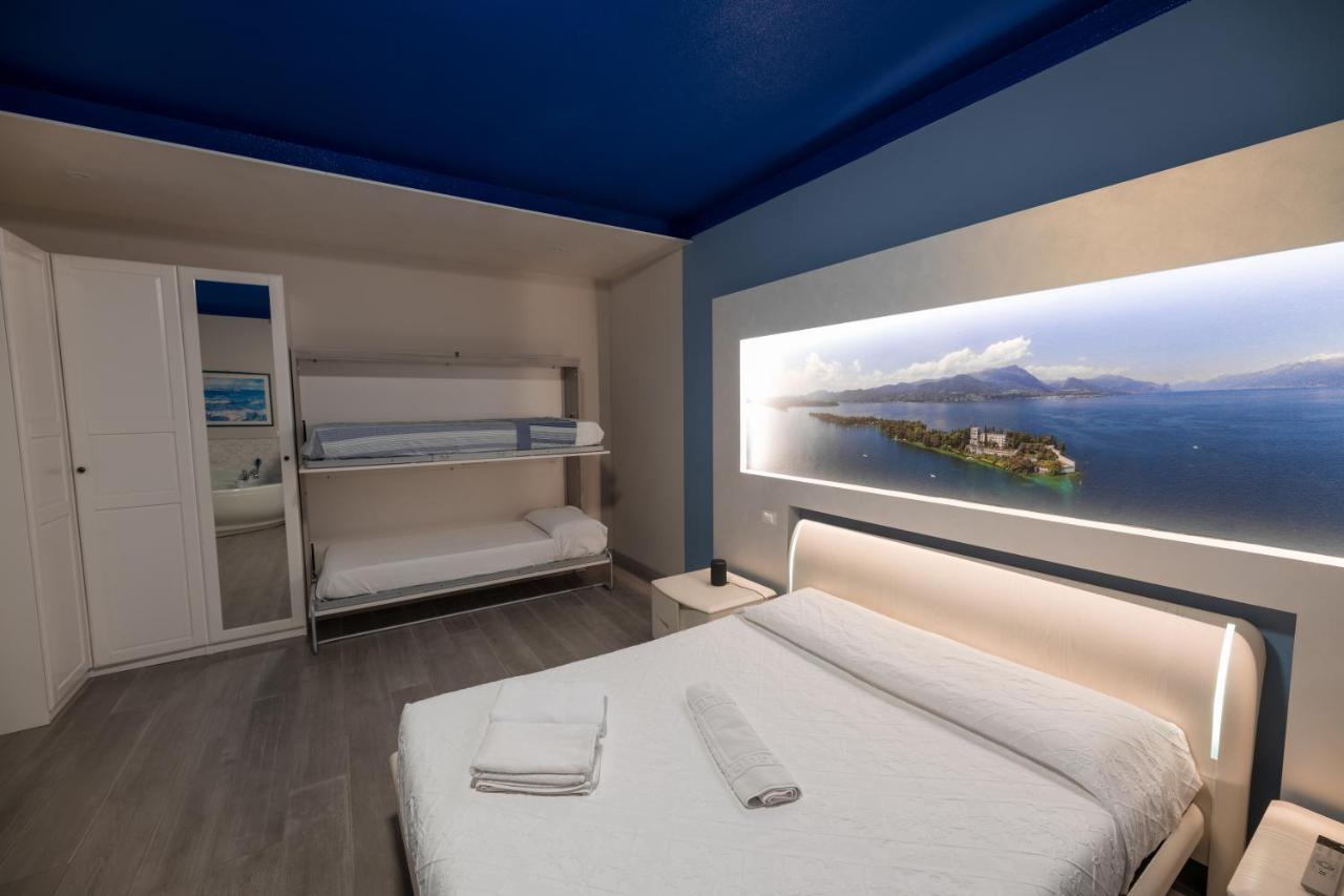 Garda Fantasy Apartment - Jacuzzi เดเซนซาโนเดลการ์ดา ภายนอก รูปภาพ